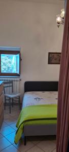 Ένα ή περισσότερα κρεβάτια σε δωμάτιο στο Casa Pesce +17 φωτογραφίες