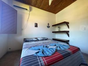 Postel nebo postele na pokoji v ubytování Residencial e Pousada Ilhéus + 48 fotografií