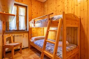 Postel nebo postele na pokoji v ubytování Cremeno Hidden Garden