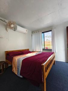 Postel nebo postele na pokoji v ubytování Abhayanand Agro Tourism