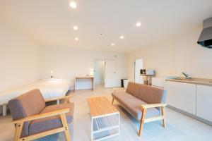 Kuchyň nebo kuchyňský kout v ubytování Hotel Meguri