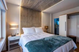 Ένα ή περισσότερα κρεβάτια σε δωμάτιο στο Cozy Home +7 φωτογραφίες