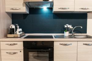 Dapur atau dapur kecil di Li Cuti Home +19 gambar