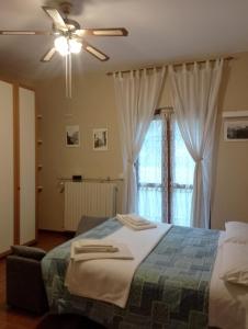 Postel nebo postele na pokoji v ubytování Allevamento B&B
