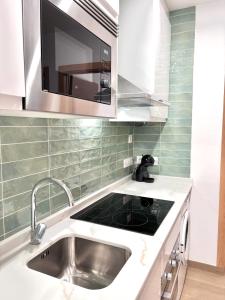 Una cocina o cocineta en Apartaments Sant Antoni