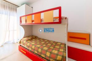 Łóżko lub łóżka w pokoju w obiekcie Condominio International