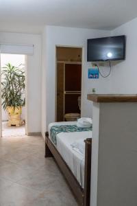 TV o dispositivi per l'intrattenimento presso Hotel Portal Guatapé