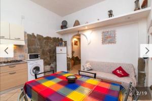 Η κουζίνα ή μικρή κουζίνα στο Cavalluccio Marino +7 φωτογραφίες