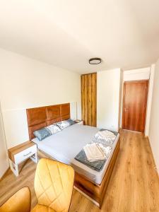 En eller flere senge i et værelse på Queen's Lounge