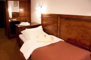 Posteľ alebo postele v izbe v ubytovaní Hotel Pod Orłem