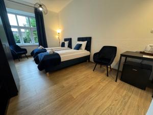 Postel nebo postele na pokoji v ubytování Apartments Iris-Topolowa + 7 fotografií