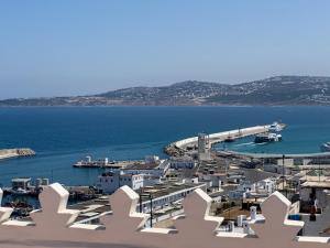 a view of a city with a harbor and the water at DAR OASIS Typical house with breathtaking views in Tangier