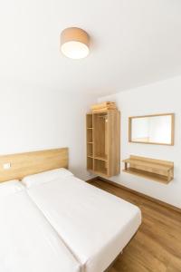 Postel nebo postele na pokoji v ubytování Apartamentos Suaces