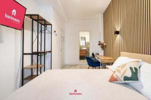 Postel nebo postele na pokoji v ubytování Suites 167