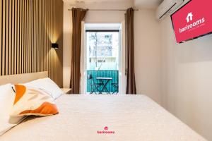 Postel nebo postele na pokoji v ubytování Suites 167