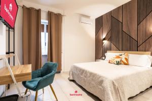 Postel nebo postele na pokoji v ubytování Suites 167