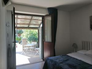 Ένα ή περισσότερα κρεβάτια σε δωμάτιο στο Agriturismo La Sosta