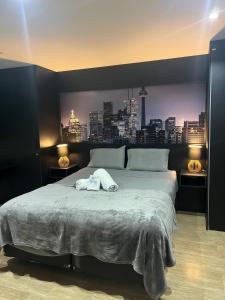 Postel nebo postele na pokoji v ubytování Loft aconchegante com varanda Campolim