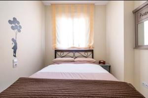 Posteľ alebo postele v izbe v ubytovaní Flamingo Sol Home