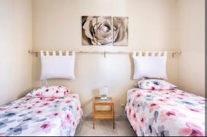 Posteľ alebo postele v izbe v ubytovaní Flamingo Sol Home