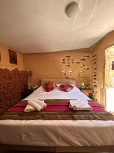Postel nebo postele na pokoji v ubytování Casa Voyage Hostel