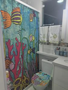 Ένα μπάνιο στο Quarto confortável pertinho da praia