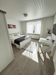 Postel nebo postele na pokoji v ubytování Hotel Pension Petra