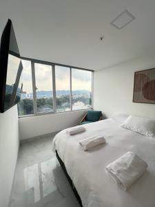 Ένα ή περισσότερα κρεβάτια σε δωμάτιο στο Luxury, Comfort, Parking +38 φωτογραφίες
