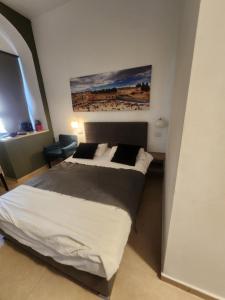 Postel nebo postele na pokoji v ubytování Ben Hillel Boutique Hotel