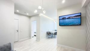 Et tv og/eller underholdning på Glass New Apartments Ultracentral