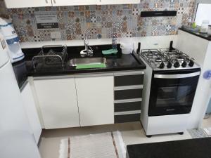 Cucina o angolo cottura di sobrado 08 com duas suítes, conf