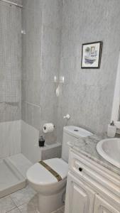 Kúpeľňa v ubytovaní Ideal Holiday Apartment City Center
