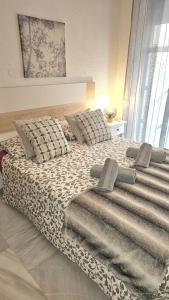 Posteľ alebo postele v izbe v ubytovaní Ideal Holiday Apartment City Center