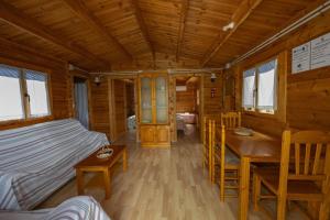Posezení v ubytování Cabañas Rurales - Las Taneas + 35 fotografií