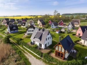 an aerial view of a small village with houses at Ferienhaus Lotsenhaus am Breetzer Bodden in Vieregge