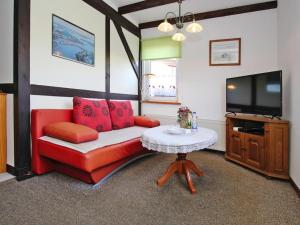 Televiisor ja/või meelelahutuskeskus majutusasutuses Ferienwohnung in der hübschen Inselstadt Malchow