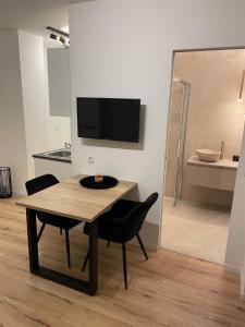 TV a/nebo společenská místnost v ubytování Apartments Torggl