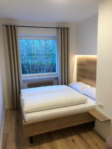 Postel nebo postele na pokoji v ubytování Apartments Torggl
