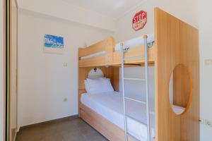 Postel nebo postele na pokoji v ubytování Deluxe Chrousso Pool Villa
