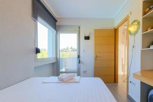 Postel nebo postele na pokoji v ubytování Deluxe Chrousso Pool Villa