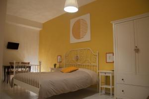 Postel nebo postele na pokoji v ubytování B&B Le Comari Salentine