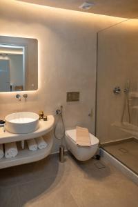 A bathroom at Depalyma Suites