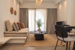 A seating area at Depalyma Suites
