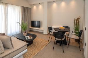 A television and/or entertainment centre at Depalyma Suites