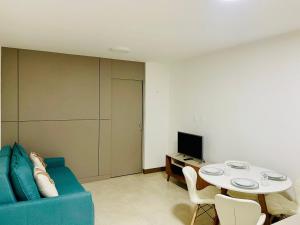 TV a/nebo společenská místnost v ubytování Apartamento de alto padrão com varanda