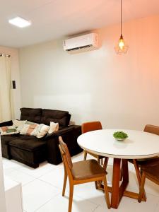 Χώρος καθιστικού στο Casa confortável e completa para sua estadia na COP 30