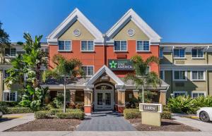 a hotel with a sign in front of it at Extended Stay America Select Suites - Orlando - Lake Mary - 1040 Greenwood Blvd in Lake Mary