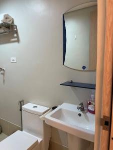 Et badeværelse på The Cozy Corner + 6 billeder