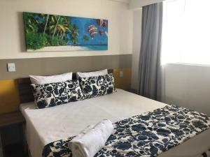 เตียงในห้องที่ Hospedagem Olímpia -SP +41 ภาพ