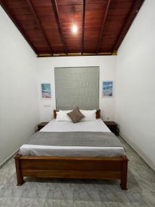 Ένα ή περισσότερα κρεβάτια σε δωμάτιο στο Peacock Paradise